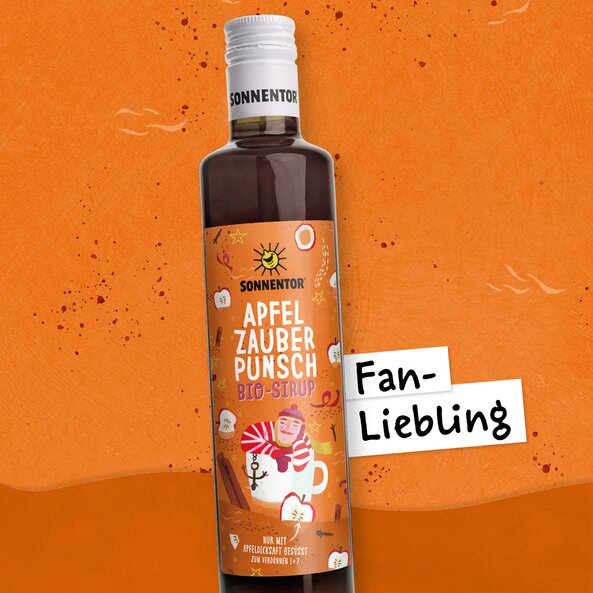 Flasche Sonnentor Apfel Zauber Punsch Bio-Sirup mit Text "Fan-Liebling" und Hinweisen "Nur mit Apfeldicksaft gesüßt" sowie Verdünnung 1+7