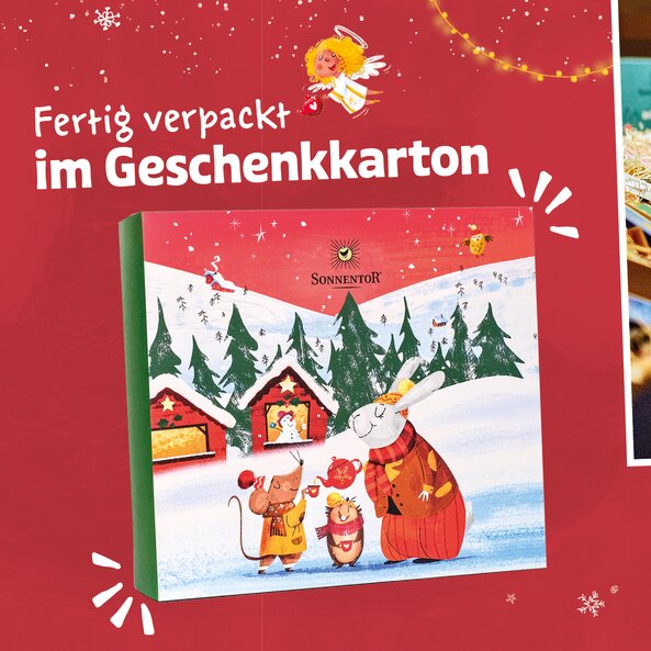 Geschlossener Sonnentor Christkindl Geschenkkarton mit Winterillustration und Text "Fertig verpackt im Geschenkkarton"